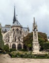 The back front of the Notre Dame de Paris church in a rainy day against the overcast sky Royalty Free Stock Photo