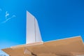 The back of the fuselage of a light-engine aircraft against the sky