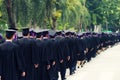 Back of graduates during commencement at university. Close up at