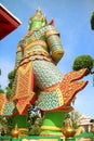 Back of the Green Giant Tossakan in Amazing Outfit, One of Two Guardian Demons at the Eastern Gate of The Temple of Dawn, Bangkok