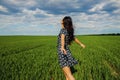 Happy Asian Woman Dancing In Green Field. Royalty Free Stock Photo