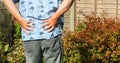 Back or hip pain. Arthritis or sciatica. Senior in pain. Royalty Free Stock Photo