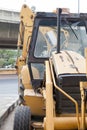 Back Hoe still on road Royalty Free Stock Photo