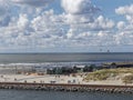 The back of Ijmuiden beach with People walking, cycling