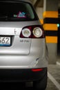 Back lamp of a parked silver colored Volkswagen Golf Plus in a parking Royalty Free Stock Photo