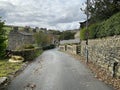 Back Leeming road, with cottages, and fields in, Oxenhope, Keighley, UK