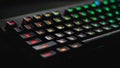 Back lighted computer gaming keyboard with RGB gradient colors Royalty Free Stock Photo