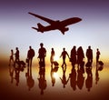 Back Lit Business People Traveling Airplane Airport Concept Royalty Free Stock Photo