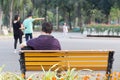Man sitting on bench park