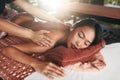 Back Massage At Thai Spa. Woman Having Body Massage At Salon Royalty Free Stock Photo