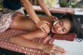 Back Massage At Thai Spa. Woman Having Body Massage At Salon Royalty Free Stock Photo