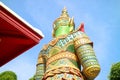 Back of Massive Green Giant Tossakan, One of Two Guardian Demons at The Temple of Dawn, Bangkok, Thailand