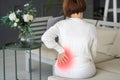 Back pain, kidney inflammation, woman suffering from backache at home Royalty Free Stock Photo