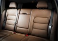 Back passenger seats in modern luxury car, frontal view, Red leather Royalty Free Stock Photo