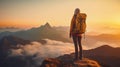 Back of person standing on rock looking out on mountain landscape