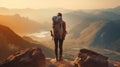 Back of person standing on rock looking out on mountain landscape