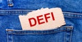 In the back pocket of the jeans there is a brown piece of paper with the text DEFI Royalty Free Stock Photo
