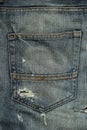 Back pocket of worn torn jeans. Royalty Free Stock Photo