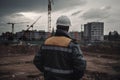 Rear portrait of a civil engineer at the construction site