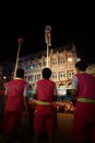 Back portrait group of men playing the musin instruments for traditional performance of Chinese New Year celebration at the public