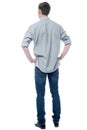 Back pose of smart young guy