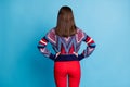 Back rear spine behind view photo of pretty young woman anonym incognito isolated over blue color background Royalty Free Stock Photo