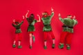 Back rear spine view full body photo of people elf dance christmas spirit wear hat xmas isolated on red color background