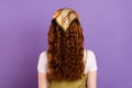 Back rear spine view photo of ginger haired young woman wear headscarf isolated on purple color background