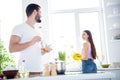 Back rear spine view photo two people idyllic spouses man mix seasoning healthy nutrition bowl salad lunch woman wash Royalty Free Stock Photo