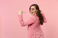 Back rear view of cheerful young woman in heart glasses looking back pointing thumbs on herself isolated on pastel pink Royalty Free Stock Photo