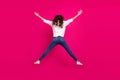 Back rear view full size photo of young girl star jump up active incognito anonym isolated over pink color background