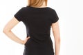 Back rear views black t-shirt Closeup on female body, woman girl in empty black Tshirt isolated on white background, t shirt copy