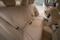 Back seat view of a c300 Mercedes sedan with tan leather Royalty Free Stock Photo