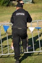 Back of a security guard in front of blurred crowd - Russia Berezniki 21 July 2018 Royalty Free Stock Photo