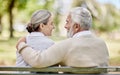 Back, senior couple and hug in park with love and view of nature, retirement together and peace. Elderly man, woman and