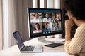 Concentrated young african american businesswoman holding video conference call. Royalty Free Stock Photo