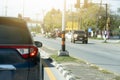 Back side of black car on the road. Royalty Free Stock Photo