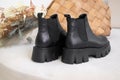 Back side of black winter shoes. Women& x27;s leather boots with natural materials Royalty Free Stock Photo