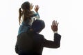 Back side middle aged Asian man in formal suil holding a little girl in overalls learning white background like a mirror