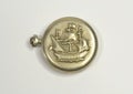 Back side of old pocket watch that shows Sailing ship Royalty Free Stock Photo