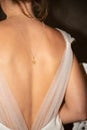 Back side portrait woman necklace jewel in sexy white dress Royalty Free Stock Photo