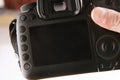 Back side of professional dslr digital photo camera Royalty Free Stock Photo