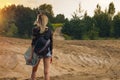 Back side of traveler girl searching right direction on map Royalty Free Stock Photo