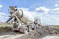 Back side view on concrete mixer, ready for pouring into transporter