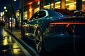 Back side view of a new shiny clean car standing on the street. Electric vehicle being charged Royalty Free Stock Photo