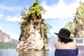 Back side of a woman sitting on long tail boat and enjoying the view Royalty Free Stock Photo