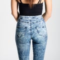 Back side of woman wearing high-waisted jeans Royalty Free Stock Photo