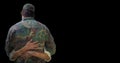 Back of soldier being hugged against black background with grunge overlay