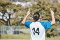 Back, success and a man with a gesture for soccer, game win and celebration of a goal. Happy, field and a football