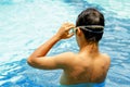 Back of teen boy at swimming pool Royalty Free Stock Photo